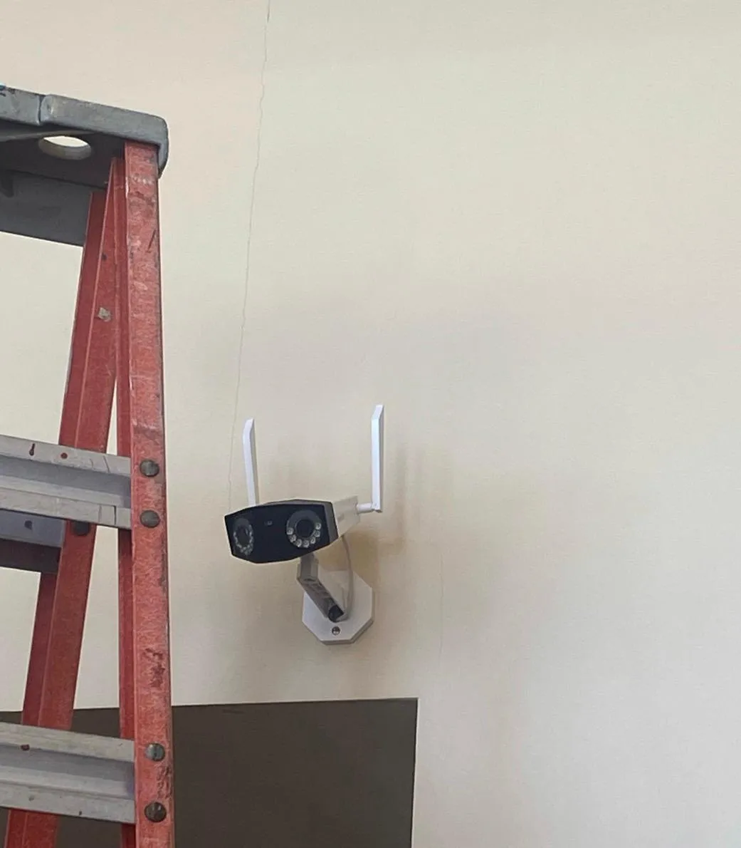 Wall-mounted camera facing the audience